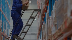 Warehouse worker stepping onto ladder retrieving inventory while cart and graph icons intensifying. Industrial, logistics, automation, supply chain, data visualization, inventory management, - Powered by Shutterstock - Get 15% off with code: PIKWIZARD15