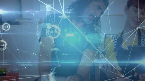 Cook tapping tablet and initiating kitchen AR data overlay while coworkers collaborating with phone. Collaboration, teamwork, innovation, technology, workflow, digital, professional - Powered by Shutterstock - Get 15% off with code: PIKWIZARD15