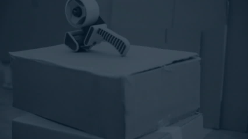 Packing desk showing dispenser on box waiting until chart overlay sliding in showing market trends. Logistics, freight, workflow, minimalism, professional, digital, enterprise