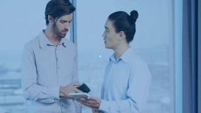 Colleagues studying devices, initiating network overlay expanding icons across business office. Technology, connectivity, collaboration, digital, innovation, communication, urban - Powered by Shutterstock - Get 15% off with code: PIKWIZARD15