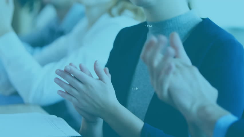 Business team clapping in response to speaker ending remarks while UI updating engagement metrics. Collaboration, innovation, analytics, technology, teamwork, professional, digital - Powered by Shutterstock - Get 15% off with code: PIKWIZARD15