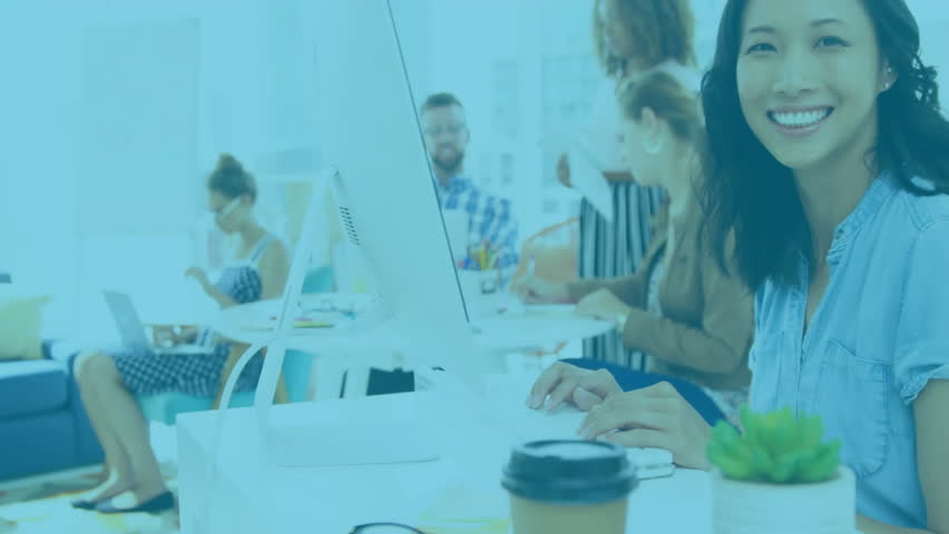 Woman typing causing social media engagement icons rising around team showing activity surge. Collaboration, teamwork, digital, networking, office, casual, innovation - Powered by Shutterstock - Get 15% off with code: PIKWIZARD15