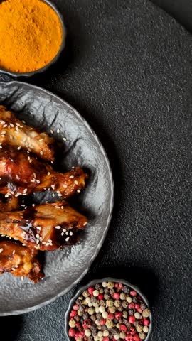 Grilled chicken wings in teriyaki sauce. Hot spicy takeaway food, fast food