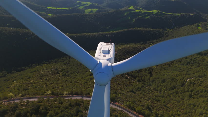 Parque Eolico de Rubio, SPAIN - April 2025. Aerial close up drone view of wind turbine farm producing renewable energy Acciona is the energy industry's global partner on sustainable energy solutions. 