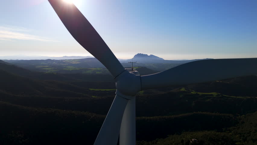 Parque Eolico de Rubio, SPAIN - April 2025. Aerial close up drone view of wind turbine farm producing renewable energy Acciona is the energy industry's global partner on sustainable energy solutions. 