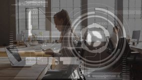 Woman glancing at smartphone then making client call in office with digital overlay persisting. Collaboration, technology, modernity, productivity, communication, workplace, data visualization - Powered by Shutterstock - Get 15% off with code: PIKWIZARD15