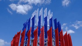 State flag of Russia flutters in the wind. Group of tricolor flags in a row. The Russian tricolor against the sky. Russian Independence Day. June 12	 - Powered by Shutterstock - Get 15% off with code: PIKWIZARD15