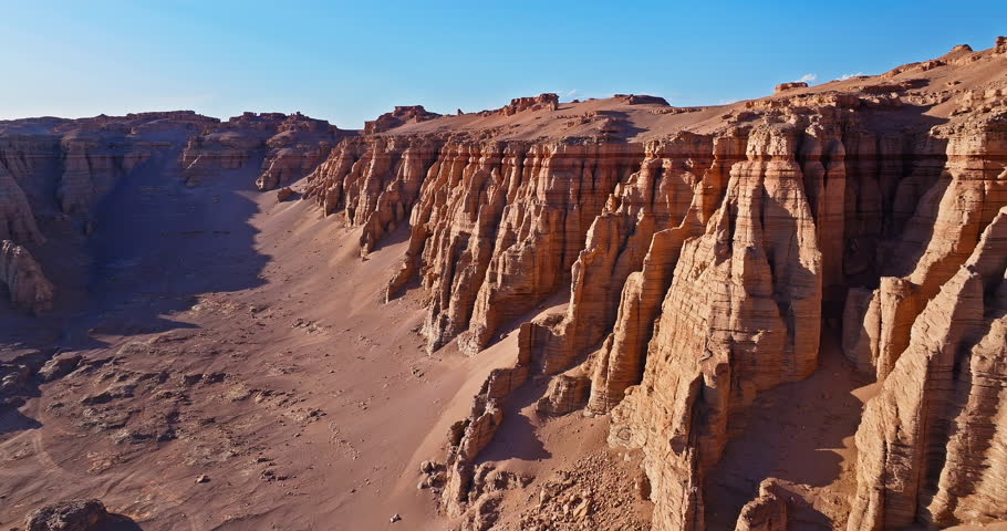 Aerial view of the yardang landform mountain in desert. Famous Dahaidao no man's land natural landscape in Xinjiang, China.