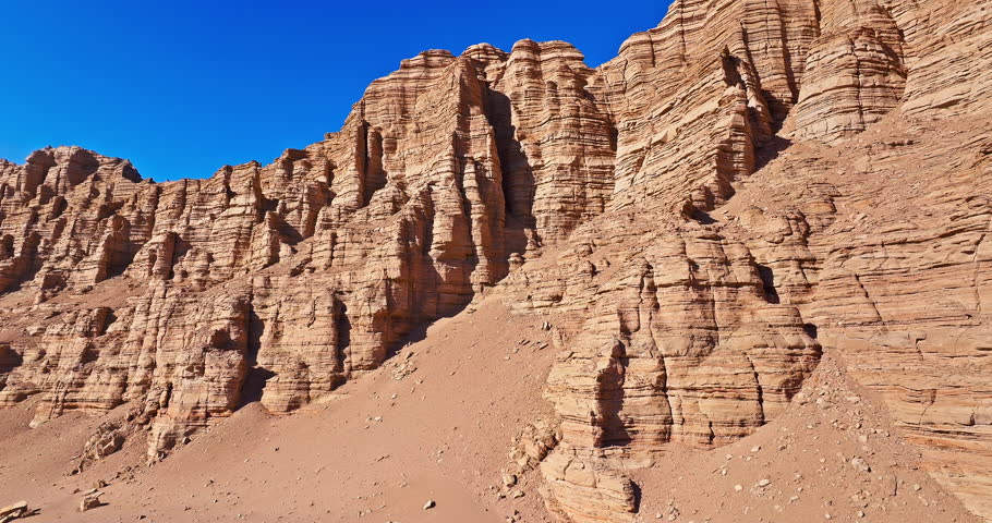 Aerial view of the yardang landform mountain in desert. Famous Dahaidao no man's land natural landscape in Xinjiang, China.