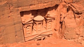 High angle view of the ancient rock-cut Treasury building Al Khazneh carved into sandstone cliffs in Petra, Jordan. - Powered by Shutterstock - Get 15% off with code: PIKWIZARD15
