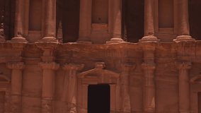 Close-up detail of the intricately carved sandstone facade at the ancient city of Petra, Jordan. - Powered by Shutterstock - Get 15% off with code: PIKWIZARD15