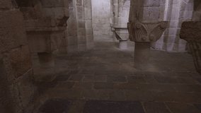 Horizontal upward panning video of the central nave in the crypt of Leyre Monastery, from stone floor to vaulted ceiling - Powered by Shutterstock - Get 15% off with code: PIKWIZARD15