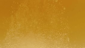 Slow motion macro shot beer pouring into a glass. Beautiful Beer Bubbles Rising Up. Loopable Animation of Sparkling Water. Video 4K - Powered by Shutterstock - Get 15% off with code: PIKWIZARD15