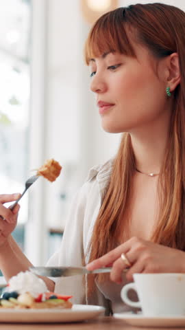 Food, eating and woman with breakfast in cafe with waffle for hospitality service at restaurant. Brunch, sweet and female person enjoying pancakes, fruit and cream with caffeine latte in coffee shop.