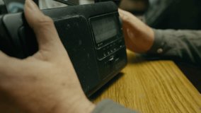 Hand manually Adjusts wave Frequency on Retro transistor Radio Dial - Powered by Shutterstock - Get 15% off with code: PIKWIZARD15