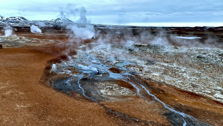 Aerial view of a group of tourists watching smoking fissures in Hverir, Iceland