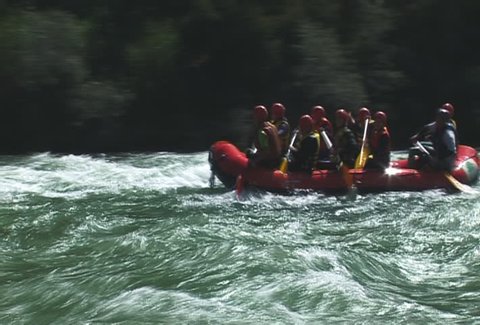 The Rubber raft with tourist on mountain river.