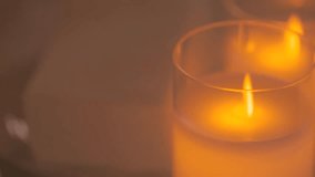 Two cozy warm lamps or candles glowing softly in ambient light. Comfortable and calming atmosphere, perfect for home decor, relaxation, or hygge-inspired interiors. - Powered by Shutterstock - Get 15% off with code: PIKWIZARD15