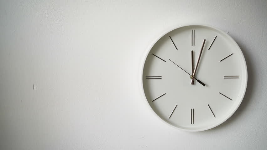 white wall clock show twelve o