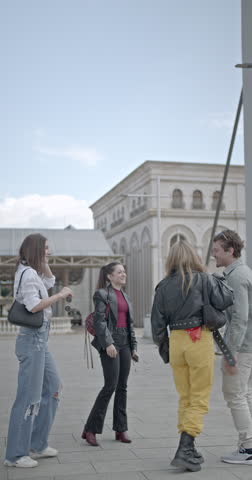 Carefree friends enjoy a fun day out in the city, laughing and making memories together.