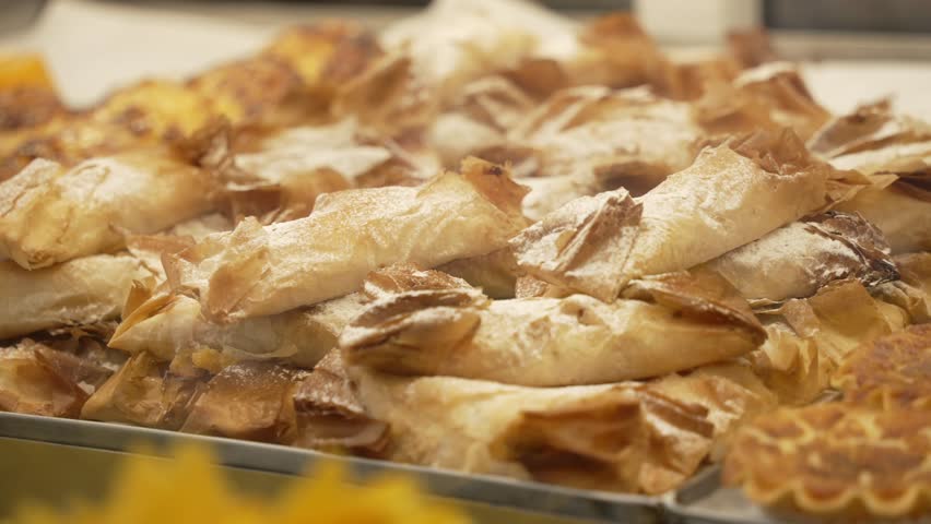 Close up of various colourful pastries in bakers shop window, Lisbon, Portugal, Europe