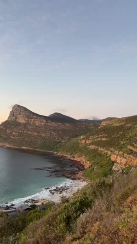 Beautiful sunrise and sunset videos of Iconic Landmarks in Cape Town, South Africa. Cape Point, Chapmans Peak reflected in pastel shades of morning and evening