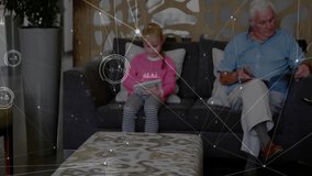 Girl tapping tablet and grandpa using phone activating graphics linking family consulting doctor. Family, healthcare, technology, medical, modern, communication, digital - Powered by Shutterstock - Get 15% off with code: PIKWIZARD15