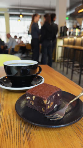 Savoring Coffee and Delicious Dessert Within a Cozy Cafe Ambiance that Invites Relaxation and Comfort