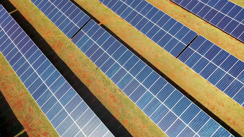 Photovoltaic Panels In Green Energy Sustainable Climate Change. Solar Panels Soaking Up Sunlight Producing Clean Energy. Countryside Sky Rural Field. Landscapes Rural Panoramic.