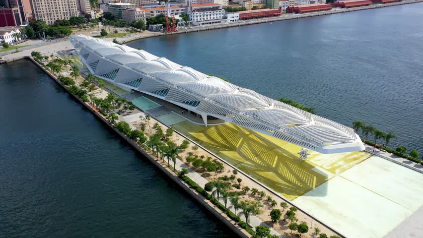 Tomorrow Museum In Historic Center Rio De Janeiro Brazil. Aerial View Of Skyscraper And Busy Traffic In The City Street. Shore Horizon Beach Sea. Seaside Panning Wide. Historic Center Rio de Janeiro.