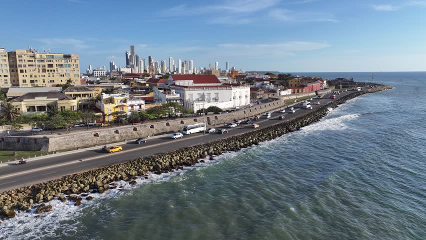 Walled City In Cartagena De Indias Bolivar Colombia. Modern City Center With Skyscrapers Reflecting The Urban Life. Town Clouds Sky Backgrounds Urban. Town Outdoor Panning Wide.