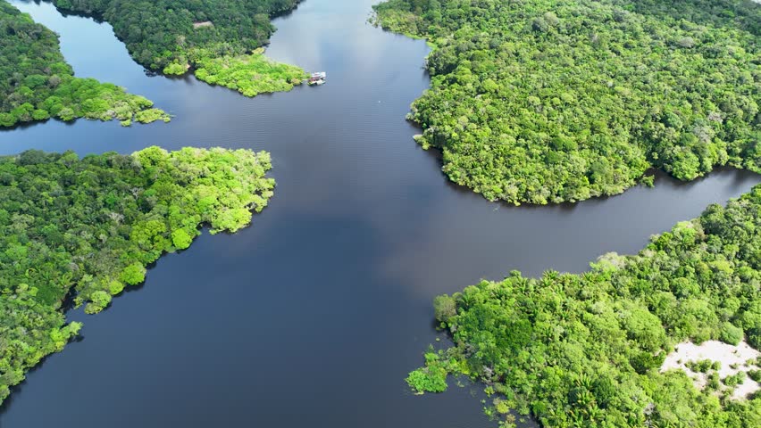 Amazon Rainforest In Manaus Amazonas Brazil. Amazon River Showing Lush Green Foliage And Riverboats. Travel Vegetation Wilderness Jungle. Travel Beautiful Day Amazon Panoramic View. Manaus Amazonas.