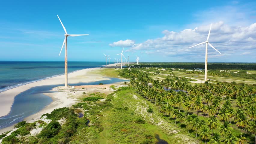 Aeolian Turbines Park In Jericoacoara Ceara Brazil. Aerial View Of A Wind Turbine Generating Clean Energy. Shore Horizon Beach Sea. Seaside Panning Wide. Jericoacoara Ceara.