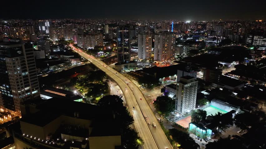 Sao Paulo Skyline In Sao Paulo Brazil. Modern City Center With Skyscrapers Reflecting The Urban Life. Building Clouds Sky Downtown Cityscape. Night Outdoors Panning Wide. Sao Paulo Brazil.
