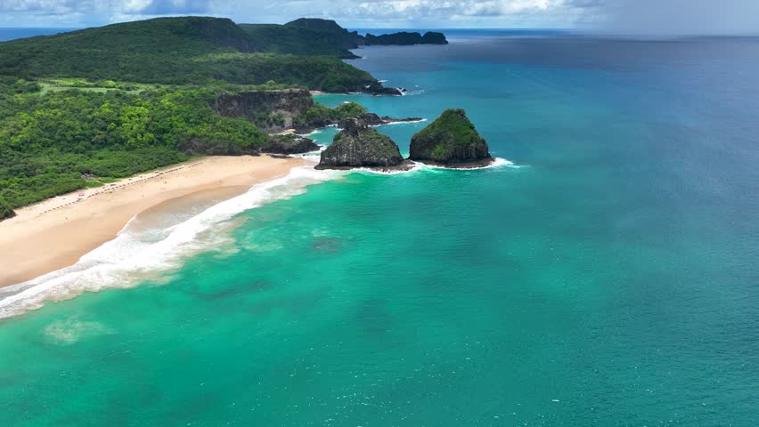 Two Brothers Mountains In Fernando De Noronha Pernambuco Brazil. Turquoise Ocean Waves Gently Crashing On Tropical Beach. Shore Horizon Beach Sea.