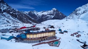 Portillo Ski Station Centre In Andes Mountains Valparaiso Chile. Ski Lift Passing Over Frozen Mountain In Winter Landscape. Outdoor Travel Andes Glacier. Outdoor Snow Covered Aerial View Floresta. - Powered by Shutterstock - Get 15% off with code: PIKWIZARD15