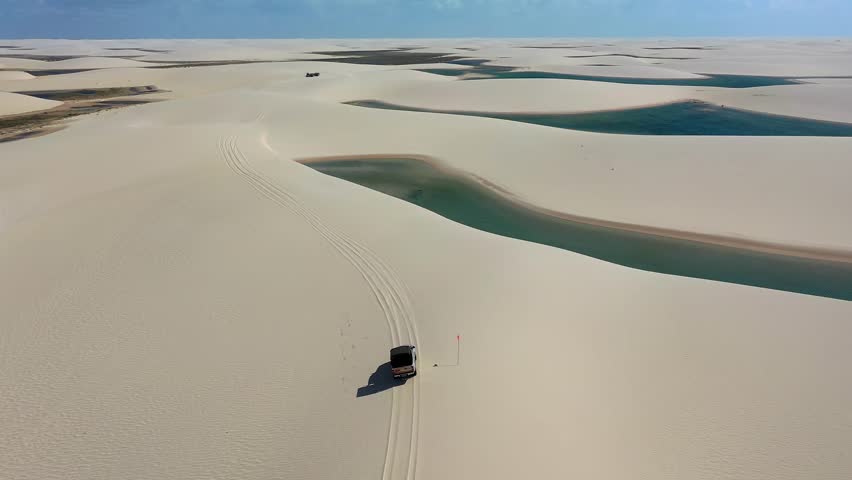 Lencois Maranhenses In Barreirinhas Maranhao Brazil. Turquoise Lagoons And Sand Dunes Creating Inspiring Landscape. Shore Sky Clouds Beach Sea. Seaside Scenic Coastline. Barreirinhas Maranhao.