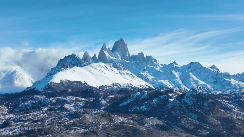 Fitz Roy Mountain In El Chalten Patagonia Argentina. Stunning View Of Icebergs Breaking Off Into The Water . Outdoor Travel Destination Patagonia Glacier. Outdoor Snow Covered Aerial.