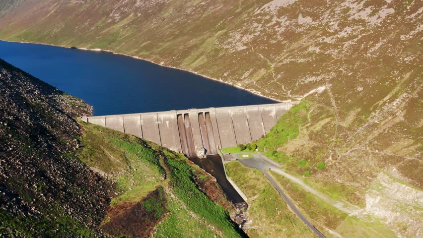 Orbiting Aerial View of Ben Crom Reservoir Nestled in the Mourne Mountains of Northern Ireland