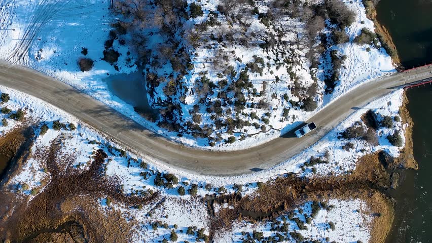 Country Road In Ushuaia Tierra Del Fuego Argentina. Breathtaking Landscape Of Forest Trees In The Rural Scene. Snowflakes Lake Glacial Snow Mountain. Snowflakes Nature. Ushuaia Tierra Del Fuego.