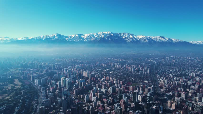 Foggy City In Santiago Metropolitan Region Chile. Sun Shining Over Fog With Wonderful Scenery In Background. Town Sky Backgrounds Urban. Town Outdoor Downtown Panning Wide.