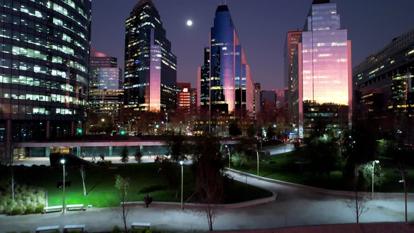 Sunset Santiago Skyline In Santiago Metropolitan Region Chile. Bird Eye View Of Famous Building In Vibrant District Of City. Sunset Sky Clouds Downtown. Sunset Outdoors Downtown Panorama.