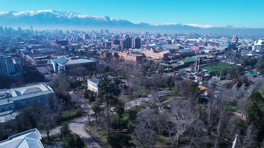 Santiago Skyline In Santiago Metropolitan Region Chile. Aerial View Of A High-Rise Buildings And Traffic Showcasing Urban Life. Business Sky Clouds Downtown Cityscape. Backgrounds Panoramic.