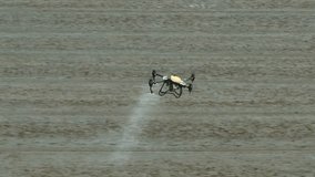 Agricultural drone in action, spraying rice paddies with pesticides, exemplifies efficiency, resource conservation, and cutting-edge automation in modern agriculture.
 - Powered by Shutterstock - Get 15% off with code: PIKWIZARD15