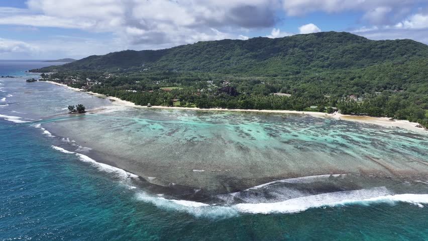 Anse Reunion Beach In La Digue Island Victoria Seychelles. Turquoise Ocean Waves Gently Crashing On Tropical Beach. Coast Horizon Seaside Summertime. Coast Outdoor Beach Panoramic.