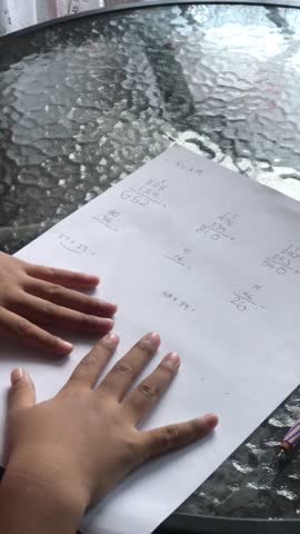 Little Girl Writing Numbers While Studying Mathematics