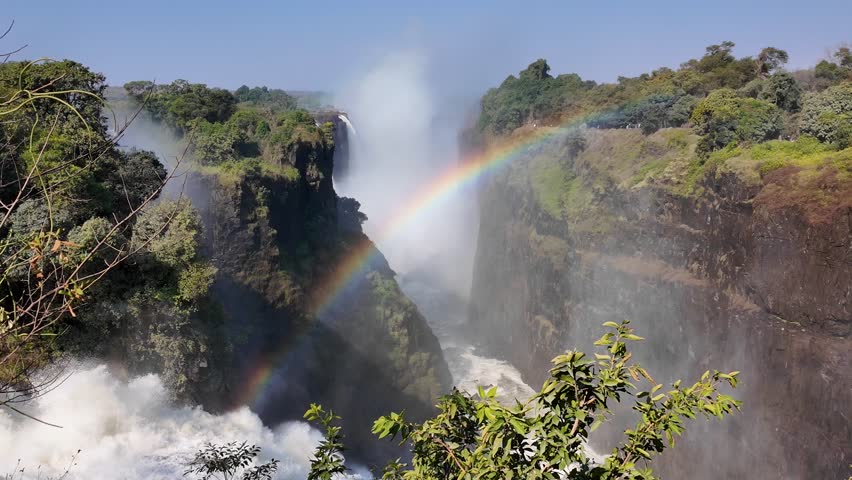 Wild Water Fall In Victoria Falls Matabeleland North Zimbabwe. Stunning Waterfalls Flowing In Natural Wonder Landscape. Landscape Dramatic Sky Waterfall Tropical. Mountain Powerful Flow.