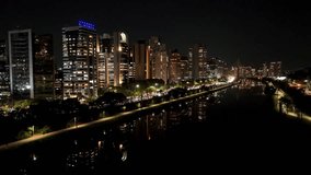 Illuminated Buildings In City Night Sao Paulo Brazil. Aerial View Of Rooftop Skyscraper In Landmark Downtown. Night Freeway Road Downtown Cityscape. Night Outdoor Famous. City Night Sao Paulo. - Powered by Shutterstock - Get 15% off with code: PIKWIZARD15