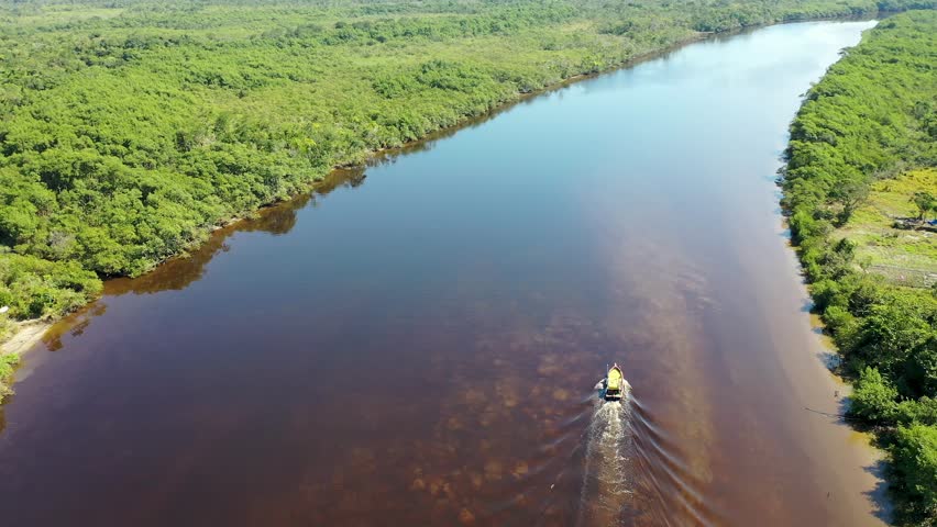 Boat Sailing In Amazon River Amazon Forest Brazil. Boat Sailing In The Summer Landscape Viewed From Above. Peru Nature Forest Brazil Bay. Peru Landmark Forest. Amazon River Amazon Forest.