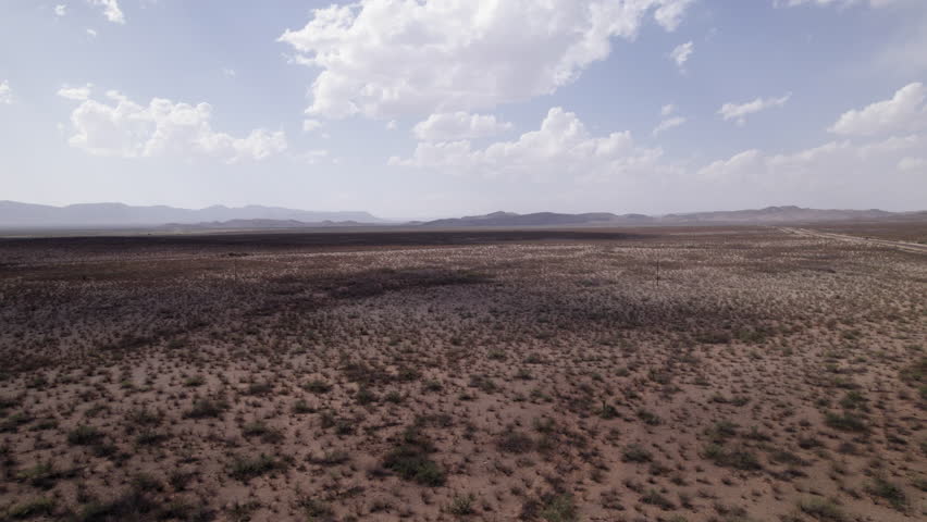 The West Texas Chihuahuan Desert with puffy clouds in the Big Bend Region, aerial view